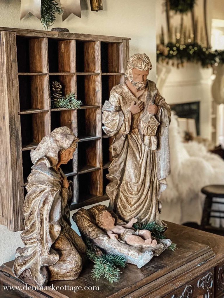 A large three piece nativity set with an Old World Finish