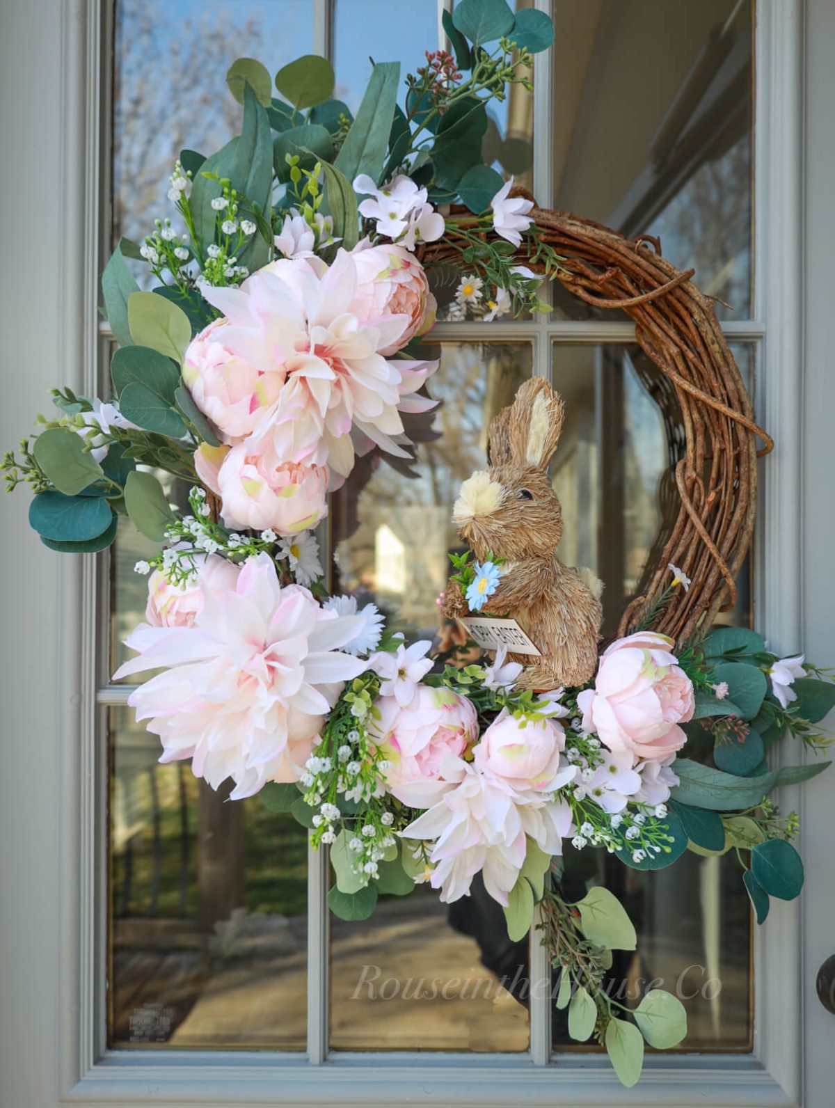 Blush and pink Flower Wreath with Bunny figure.
